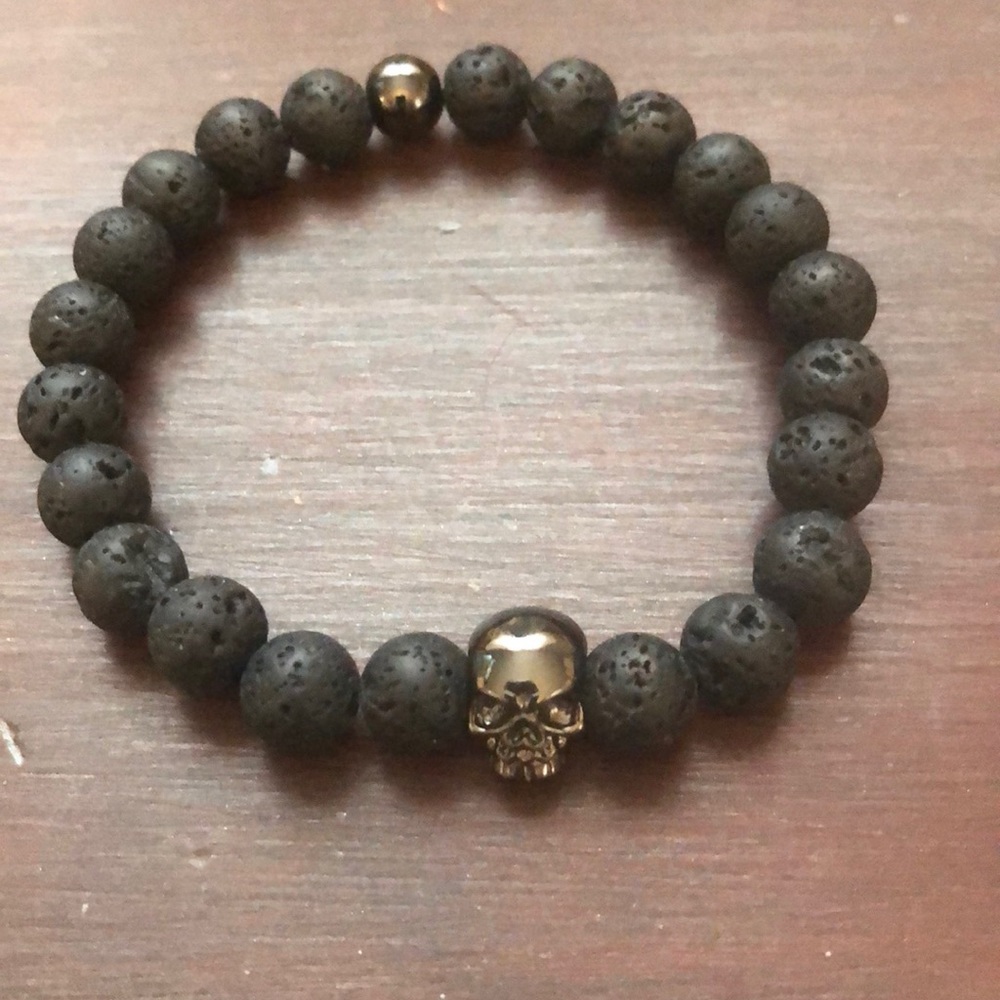 Stretch lava stone and skull bracelet